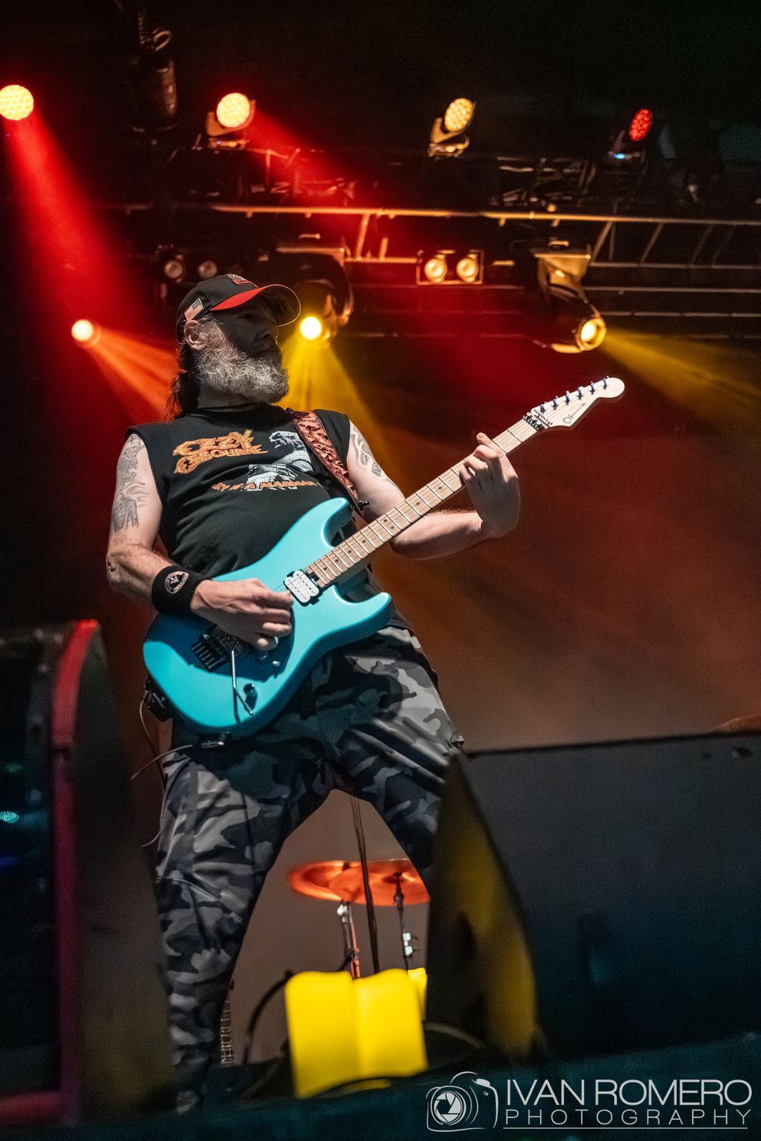 A guitarist in red light